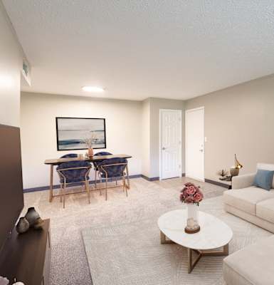 a living room with a couch and a table