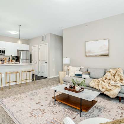 a living room with a couch and a coffee table