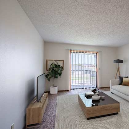 a living room with a white couch and a coffee table