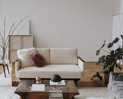 a living room with a couch and a coffee table