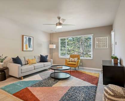 a living room with a couch and a coffee table