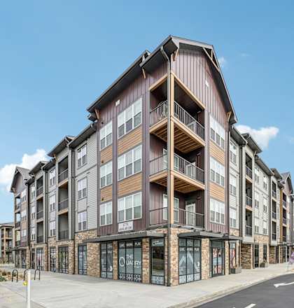 a building with balconies on the side of a street at The Quarry Luxury Apartment Homes, Fort Collins, 80526