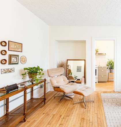 a living room with a couch and a chair