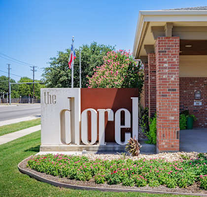 a building with a large sign that says the door