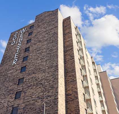 The Wester building is made of brick and has a tall, narrow structure.
