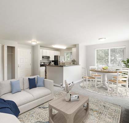 a living room with a couch and a table