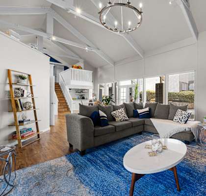 a living room with a couch and a coffee table