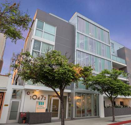 A modern building with the number 1047 on it.