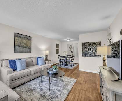 a living room with couches and a table