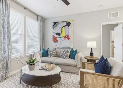 a living room with a couch and a coffee table