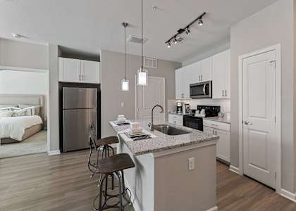 Kitchen Island With Pendent Lights at Citadel at Westpointe, San Antonio, Texas