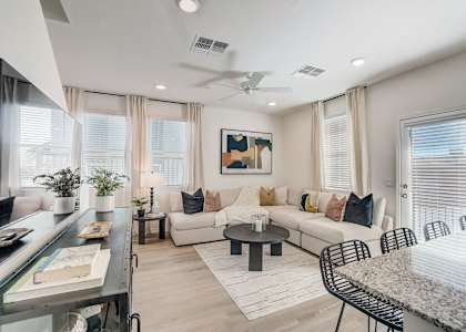 a living room with a couch and a table