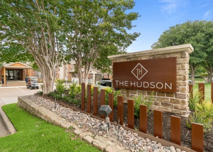 a photo of the hudson sign in front of the building