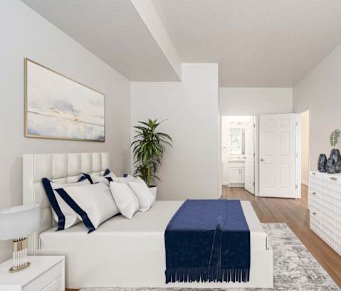 White Bedroom with nightstand at Woodland Meadows, Michigan