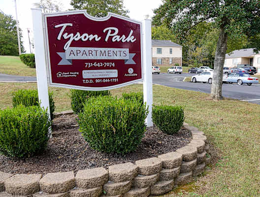 a sign for tyson park apartments