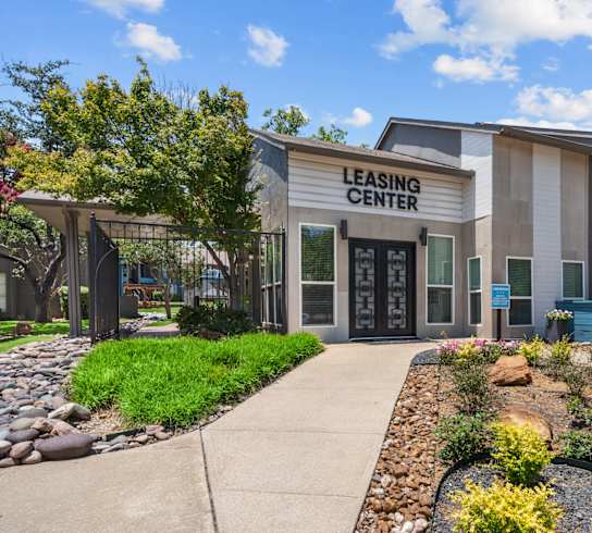 a building with the words leasing center on it  at Vesper, Dallas, 75254