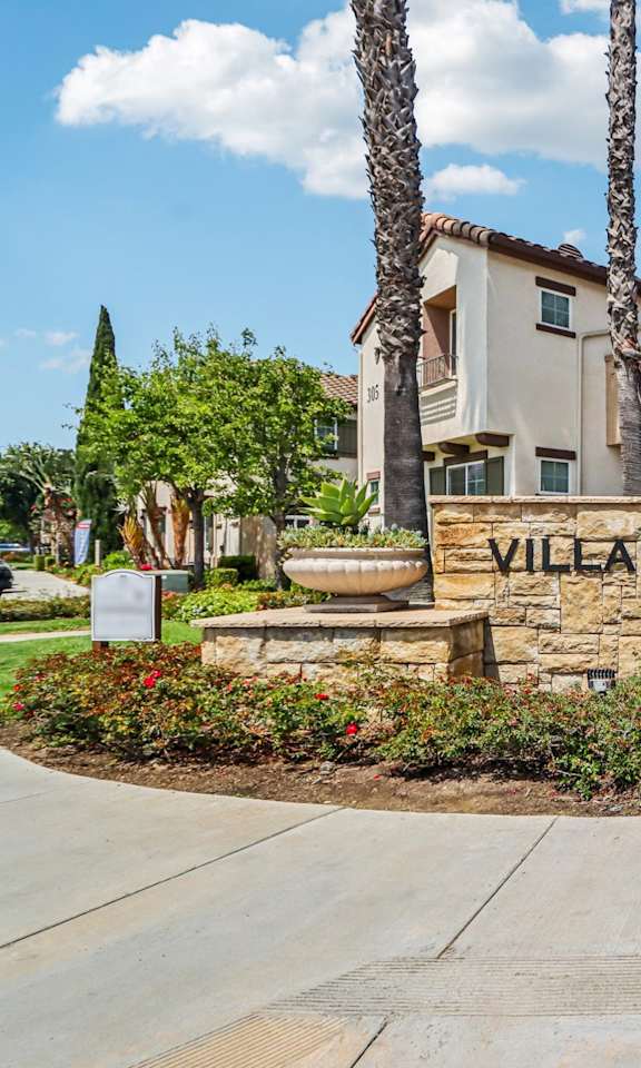A sign that says Villas at the Park