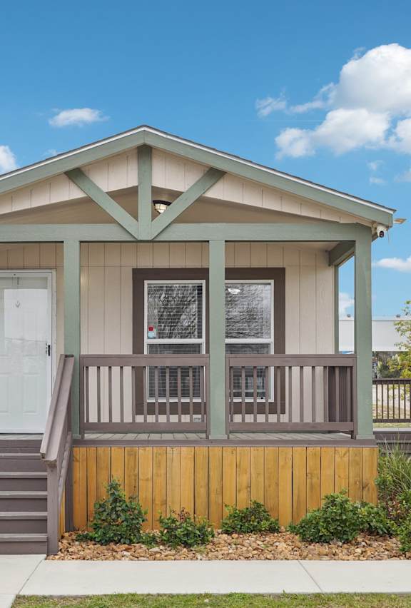 A Small House with a Porch at Buckingham Village Apartments, Universal City