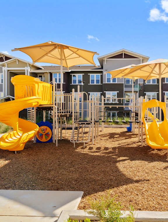 the playground at the flats at big tex apartments