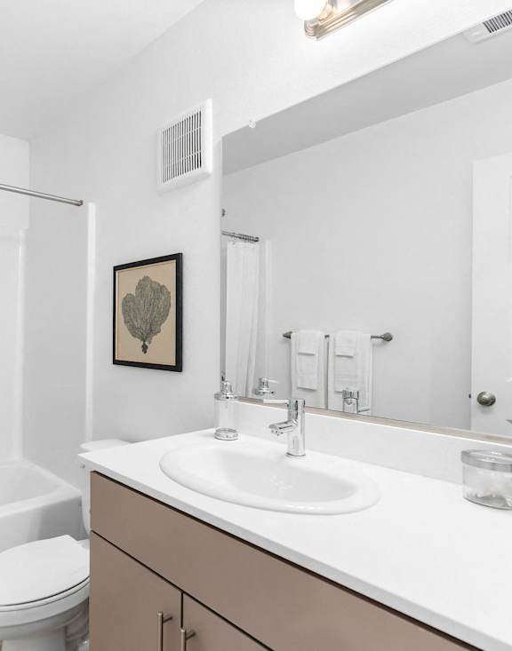 A white bathroom at Holmes Park Townhomes, Oregon City, OR