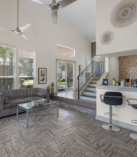 a living room with a white couch and two green chairs at Vesper, Texas, 75254