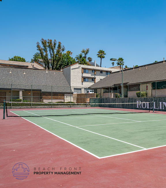 A tennis court with the name "POR LINGWOOD" on it.