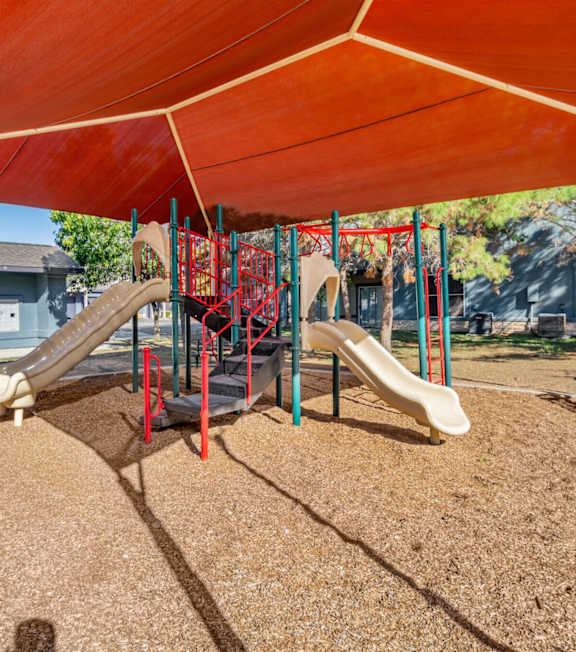 A spacious gym with treadmills, weights, and exercise equipment.