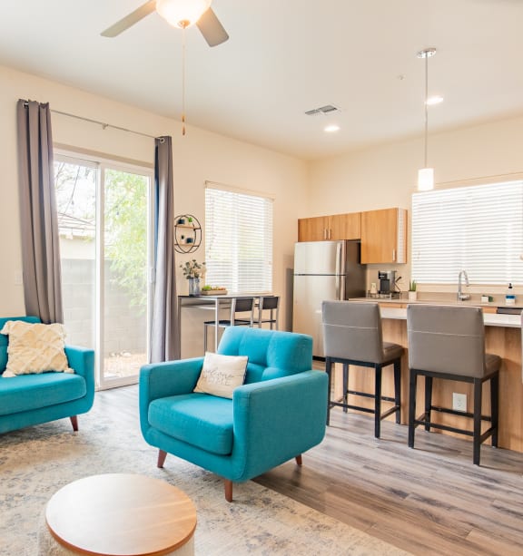 Couch in living room at Villas on Olive in Peoria, AZ 85345