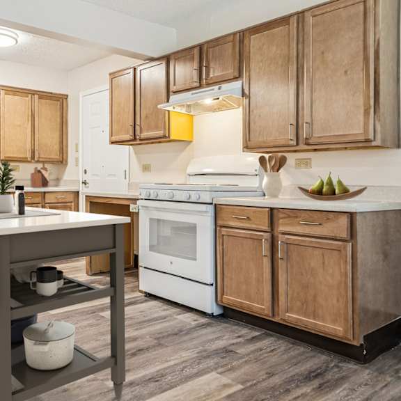 A Kitchen With a White Fridge at Hilldale Apartments, Memphis, TN