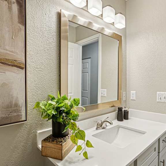 Bathroom sink and mirror at The Grove Brentwood, Nashville, 37211