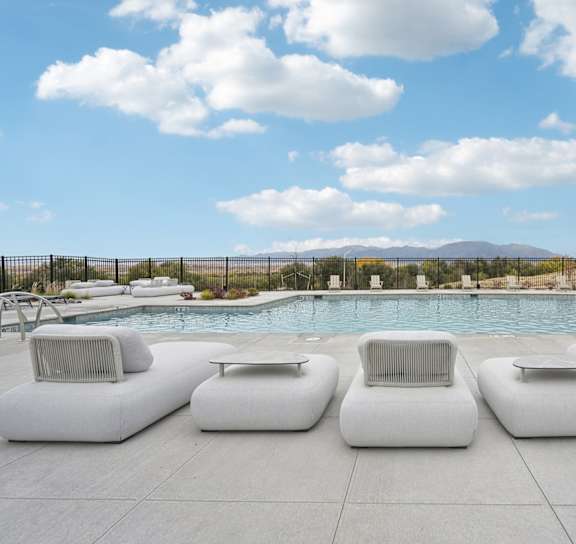 relaxing chairs by the pool at The Garrison, Fountain