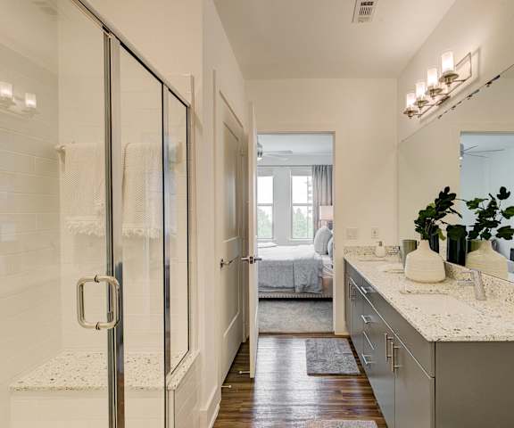 The bathroom with a sink, toilet, shower at Florence at the Harbor. 