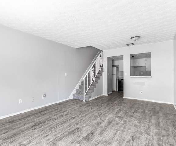 apartment living with stairs at Jacksonville Heights Apartments