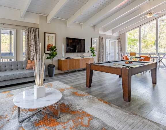 a living room and dining room with large windows at Tucker Square, Stone Mountain, Georgia