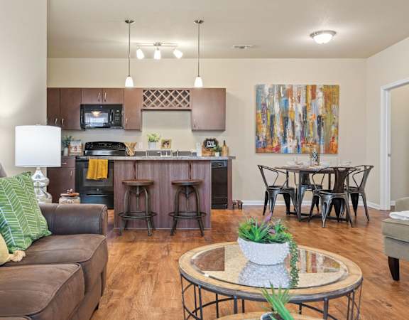 Spacious Living Area With Wood-Style Flooring