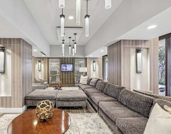 a living room with couches and a table