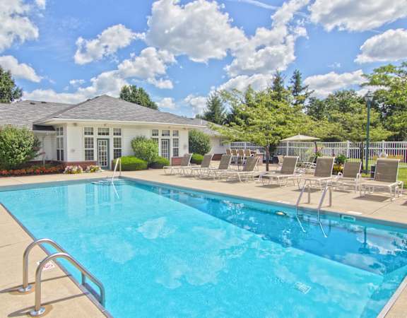 our apartments have a resort style pool with chairs
