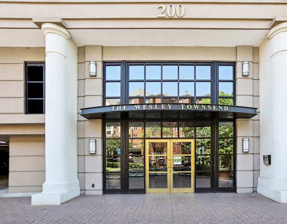 The front of a building with a sign that says The Wesley Townsend.