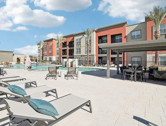 our apartments at the district feature a pool and lounge areas at The Maddox Luxury Apartment Homes, Arizona, 85326