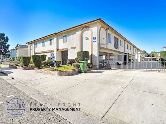 A building with the words Beach Front Property Management on the side.