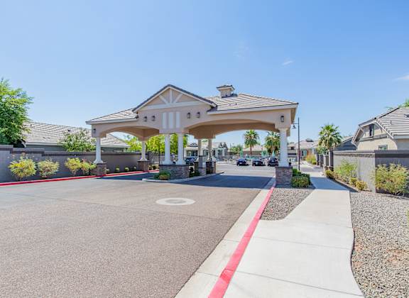 the driveway to the clubhouse at Villas on Olive in Peoria, AZ 85345