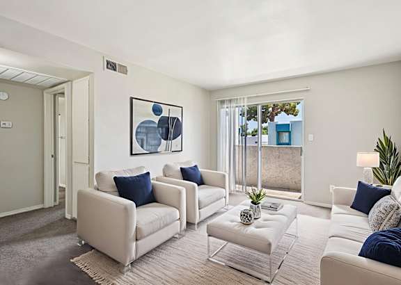 Living room with attached balcony at Sycamore Square Apartments, Mesa, 85202