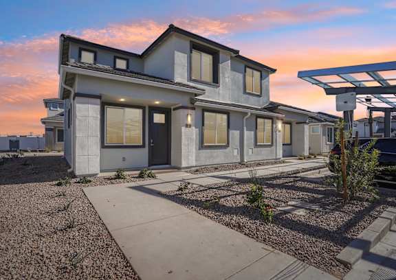 Spectacular View of a house and sunset at The Ranches at Gunsmoke, Maricopa, 85138