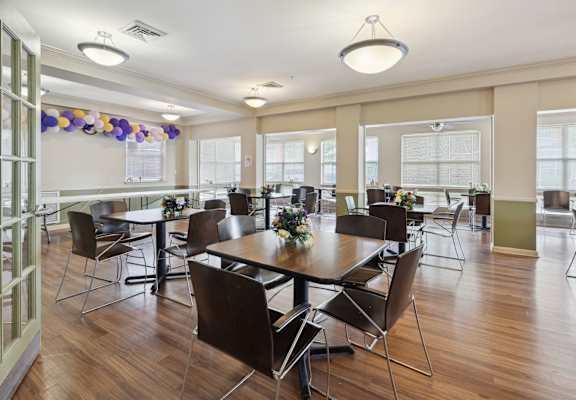 a large room with tables and chairs