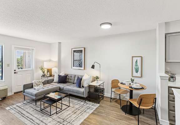 a living room with a couch and a table