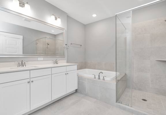 a bathroom with a bathtub and a sink