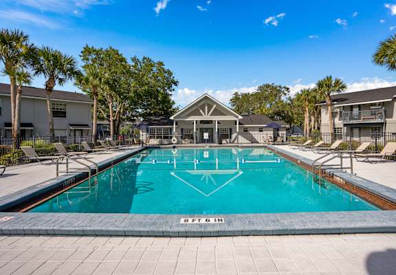 A swimming pool with the depth marked as 8 feet 6 inches at Oak Reserve at Winter Park, Winter Park
