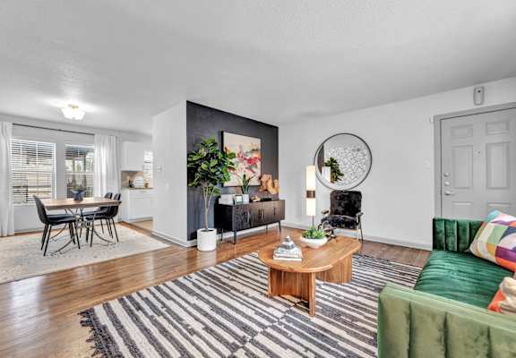 an open living room and dining room with a table and chairs at Sunset Ridge, Texas