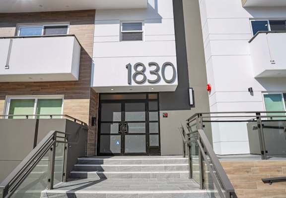 a view of the entrance to an apartment building