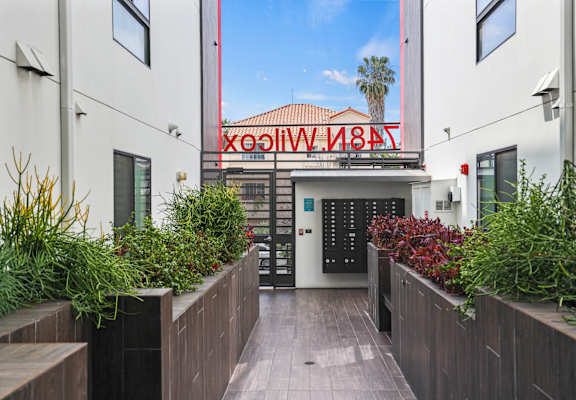 the entrance to a building with a sign that reads ya ya bar